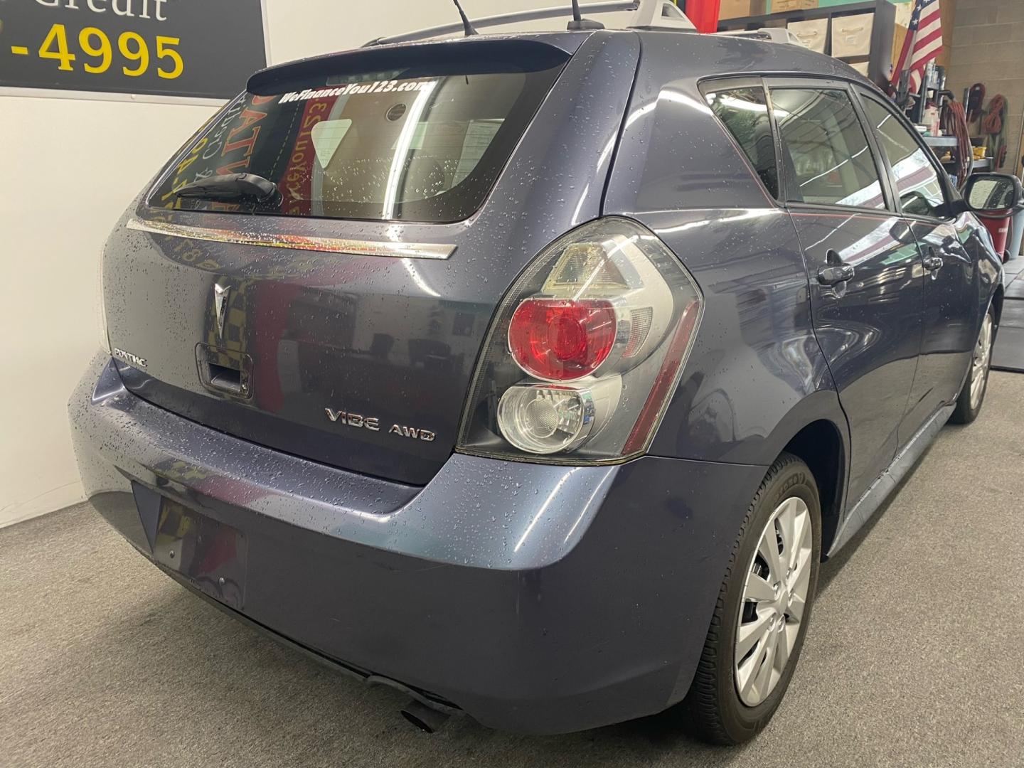 2009 BLUE /black Pontiac Vibe AWD (5Y2SM67059Z) with an 2.4L L4 DOHC 16V engine, 4-Speed Automatic Overdrive transmission, located at 533 S West End Blvd., Quakertown, PA, 18951, (877) 257-4995, 40.343994, -75.303604 - Photo#3